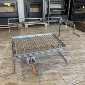 Sistema de cadenas inoxidable para barbacoa de obra con parrilla recoge-grasas